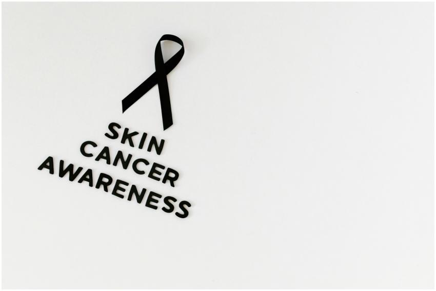 Black ribbon and text promoting skin cancer awaren