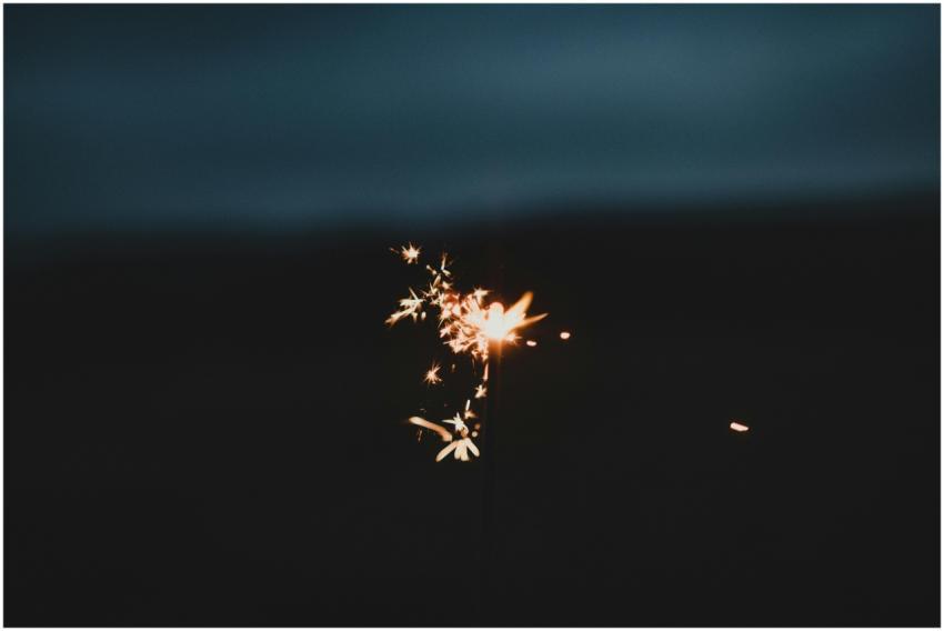 A mesmerizing sparkler glowing brightly against a