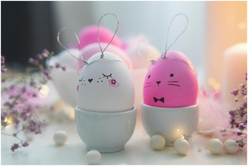 Charming Easter eggs with bunny faces in soft past