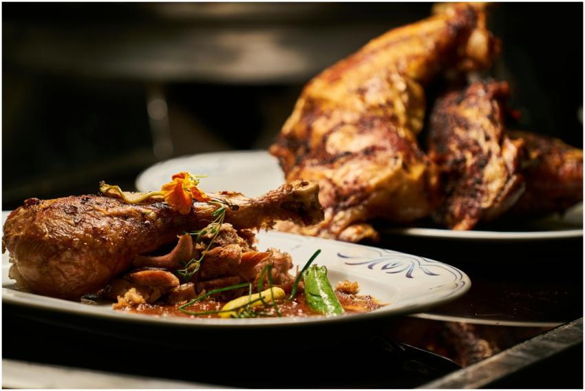 Close-up of a deliciously roasted chicken dish ser