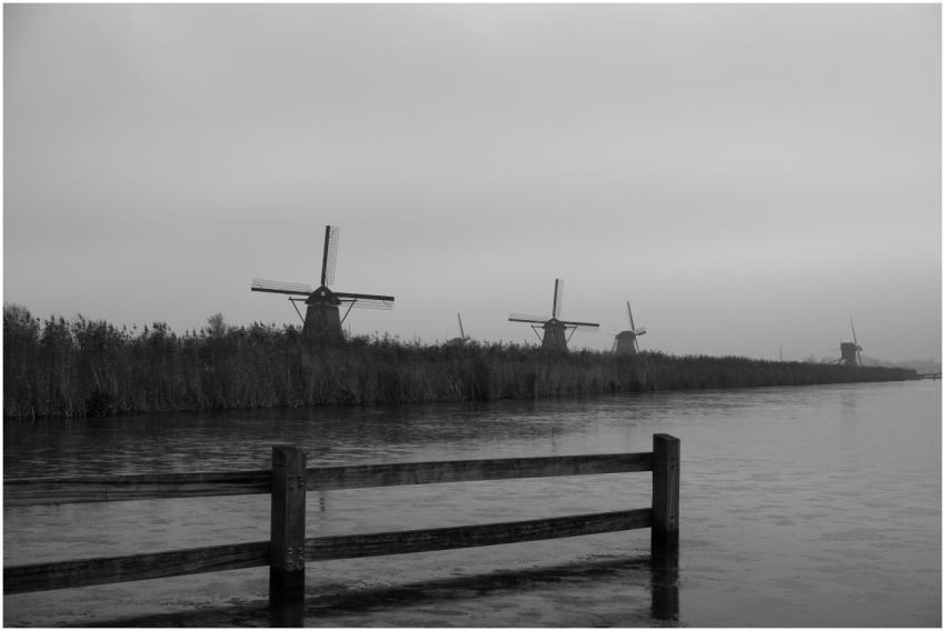 Black and white photo of iconic windmills in Kinde
