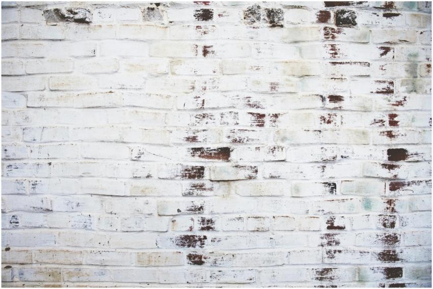 A high-resolution image of a white painted brick w