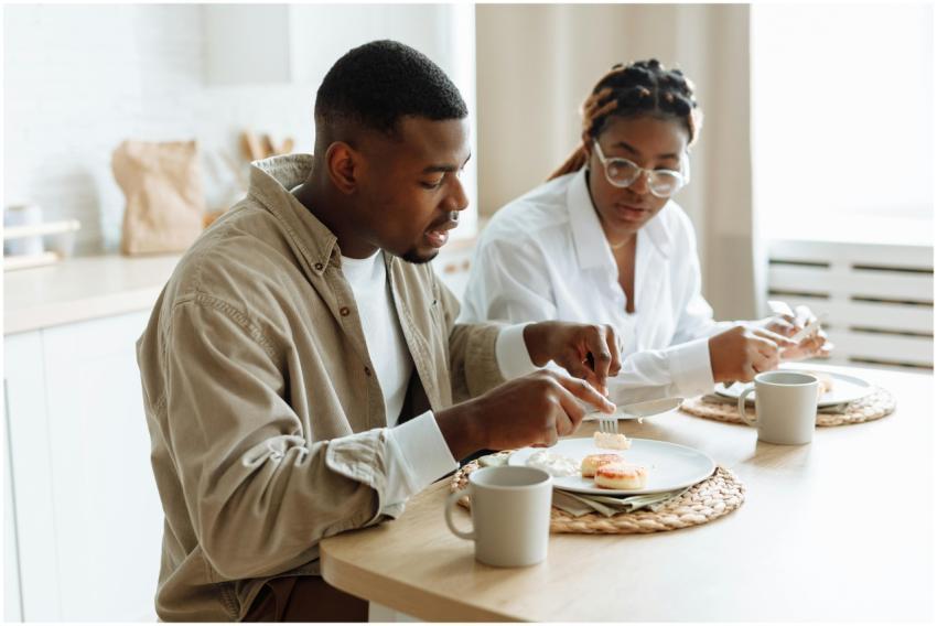 A loving couple enjoying a breakfast meal together