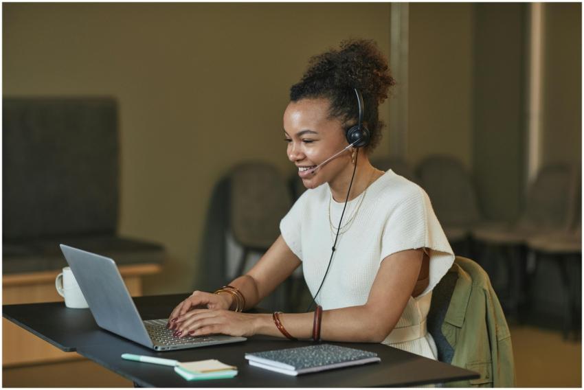African American woman in a call center setting, w