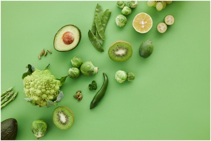 Top-down view of assorted fresh green vegetables a