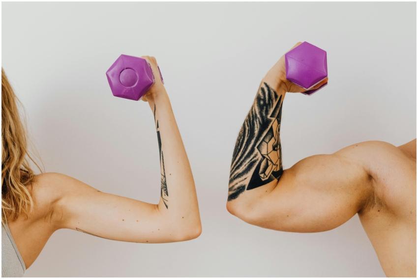 Two individuals flexing their muscles with purple