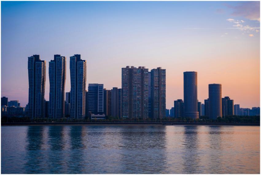 Stunning view of Hangzhou's skyline at sunset, sho