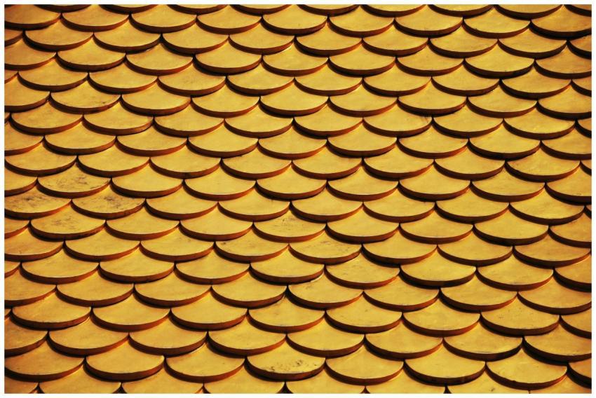 Close-up of a golden scaled roof pattern, ideal fo