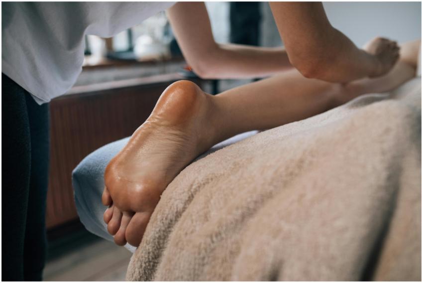 A soothing foot massage in a calming indoor settin