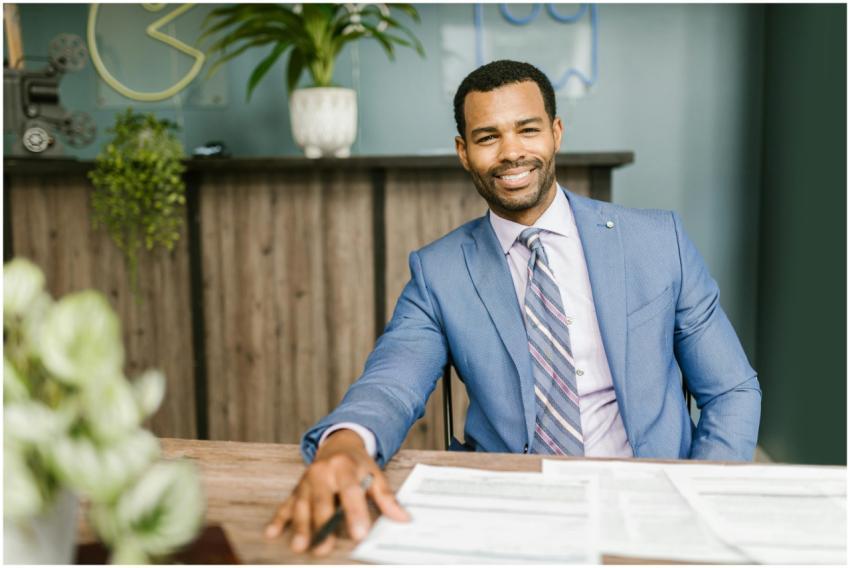Confident businessman in corporate attire smiling