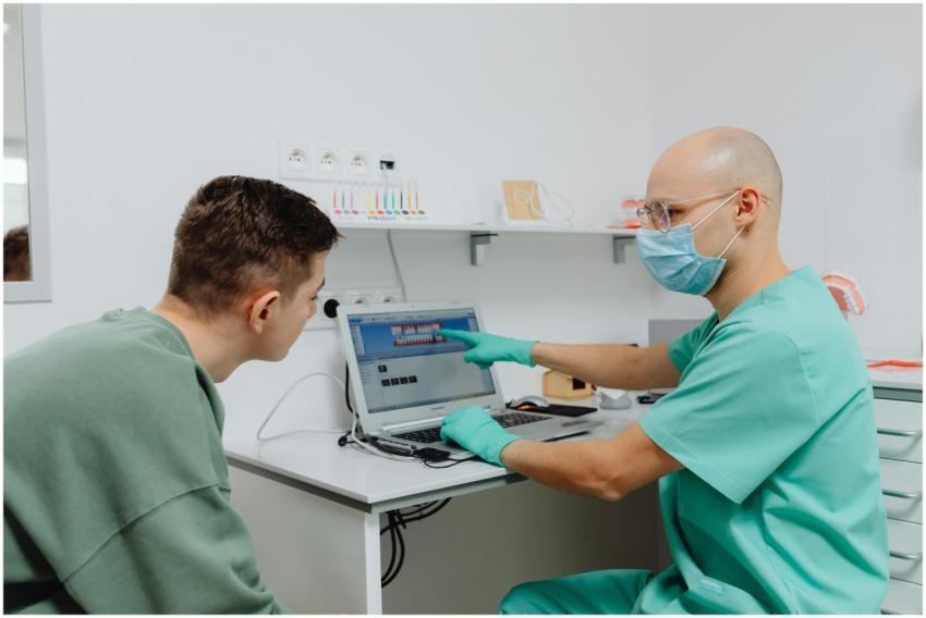 Dentist and patient discussing a treatment plan us