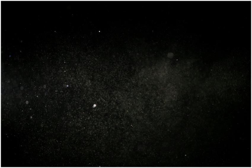 Close-up of dust particles floating in space again