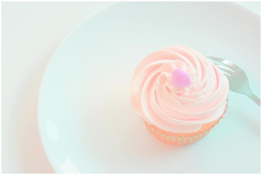 Aesthetic pastel cupcake with heart-shaped decorat
