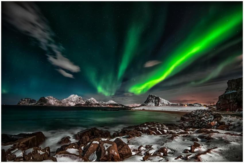 Captivating view of the Northern Lights over snow-