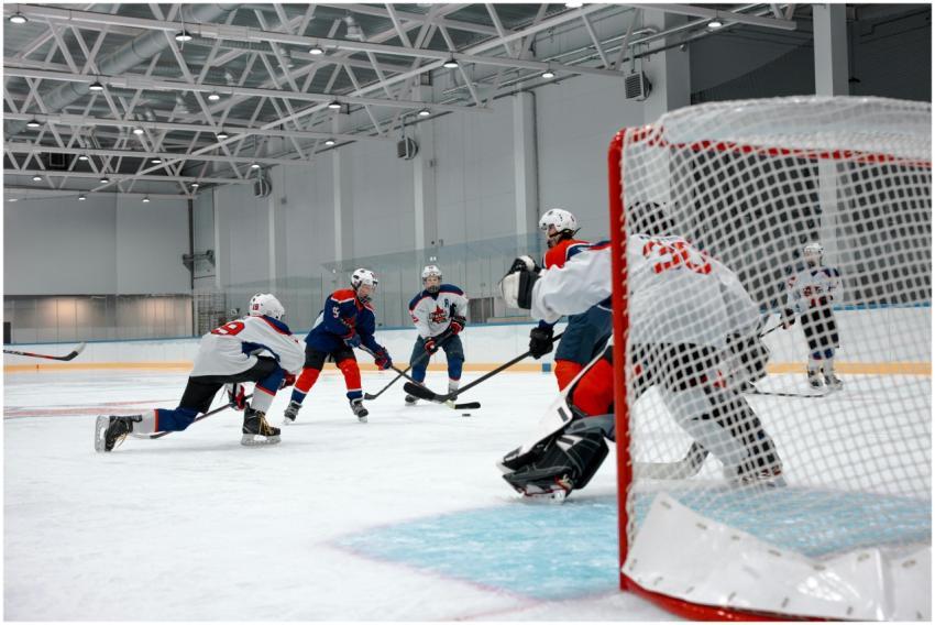 Competitive ice hockey game with players in action