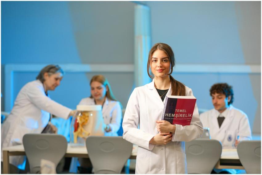 Young nursing students engaging in lab study, show