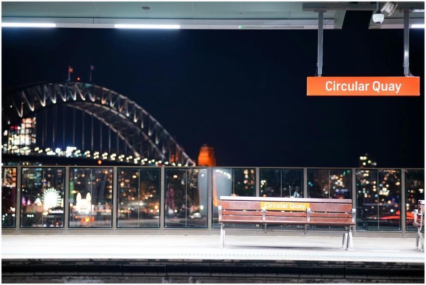 Circular Quay station platform at night with Sydne