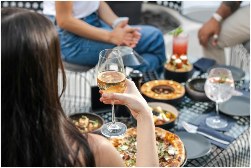 A group enjoying a luxurious outdoor dining experi