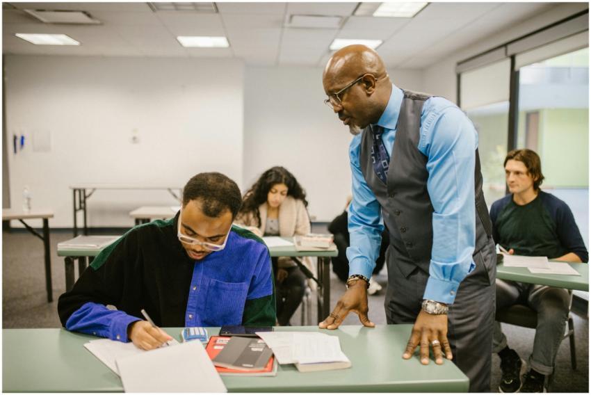 Educator supervising students during a test in a c
