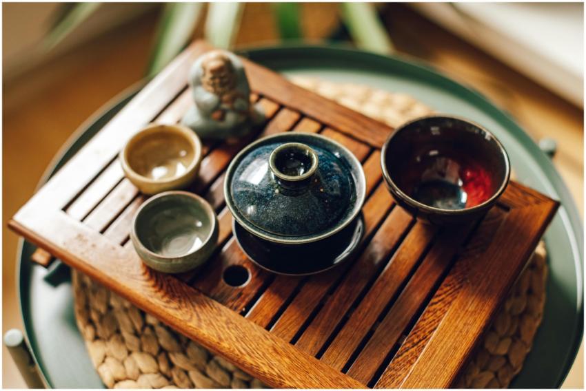 Ceramic tea set on a wooden tray, showcasing Japan
