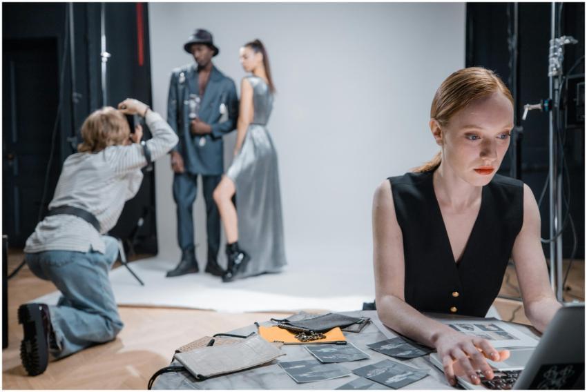 Photographer capturing fashion models during a pro