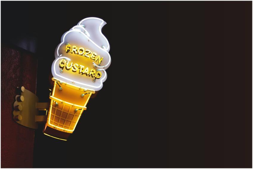 Bright neon ice cream sign advertising frozen cust