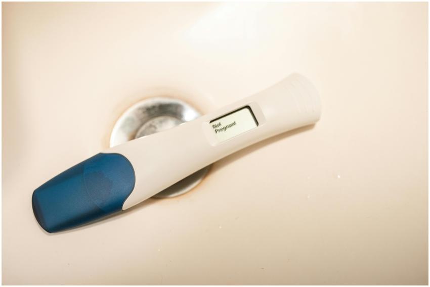 Close-up of a digital pregnancy test showing a neg