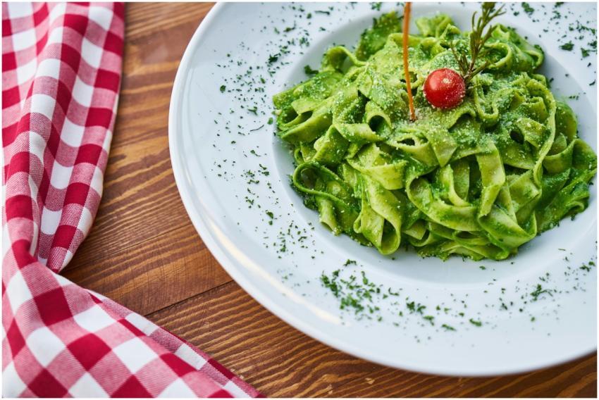 Delicious fettuccine pasta tossed in vibrant green
