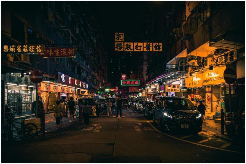 Explore the vibrant neon-lit streets of Hong Kong