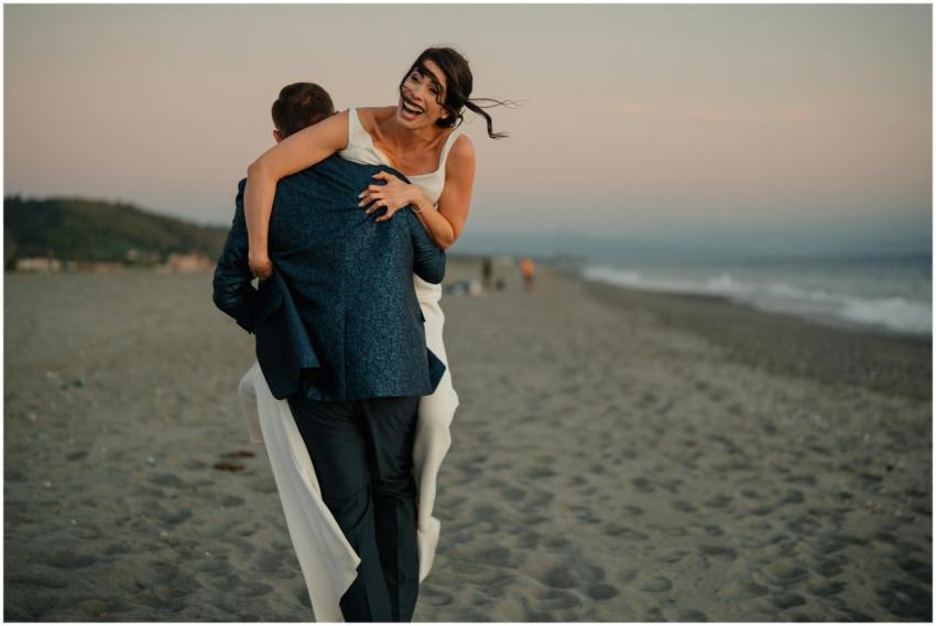 Joyful Couple Celebrating Beach