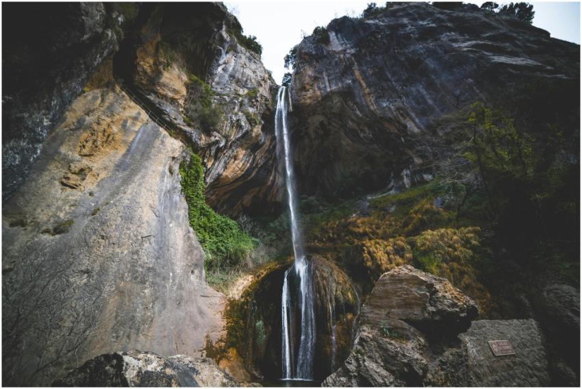 Breathtaking view of a waterfall cascading down ro