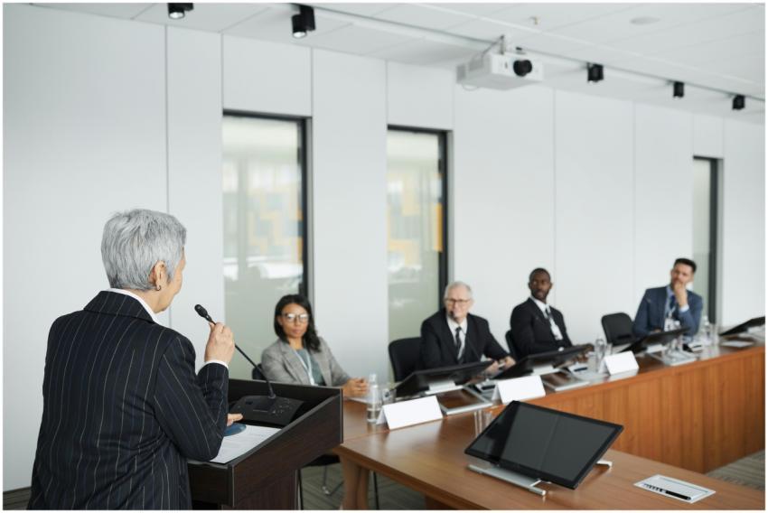 A diverse group of professionals engaging in a bus