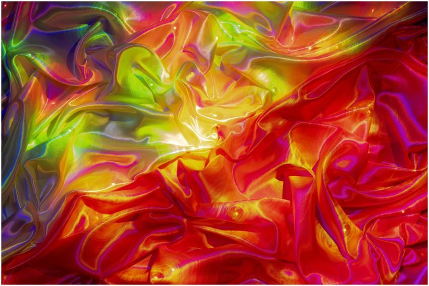 Dynamic abstract pattern of colorful satin fabric
