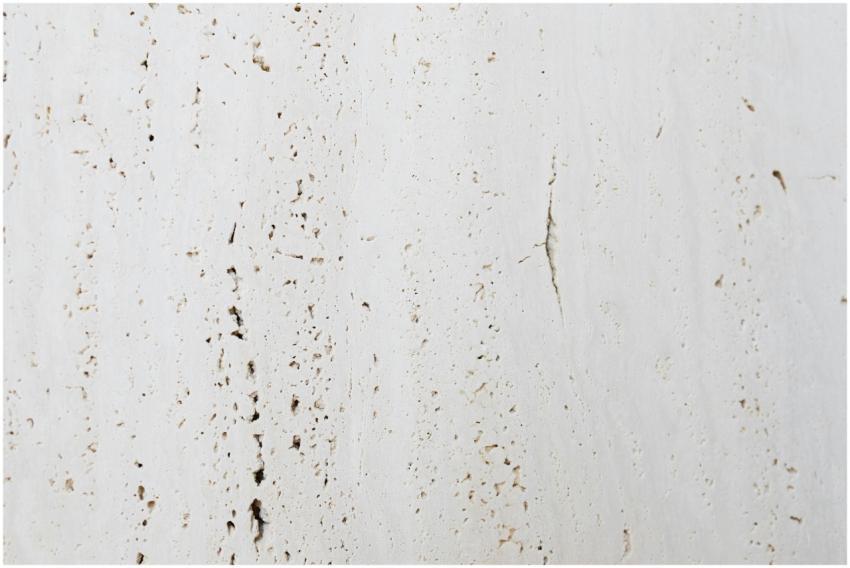 A detailed close-up of a white wall texture showca