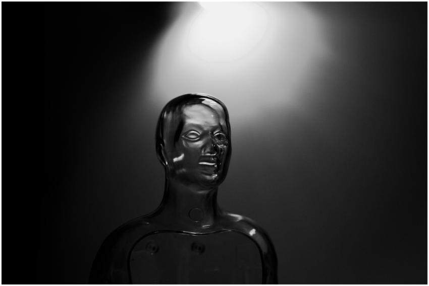 A futuristic transparent mannequin illuminated by