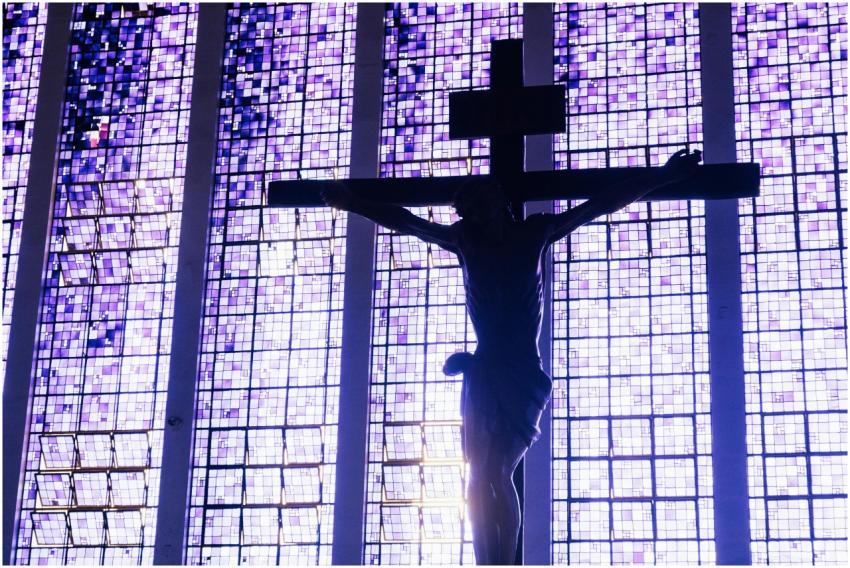 Dramatic silhouette of Jesus Christ crucifixion ag