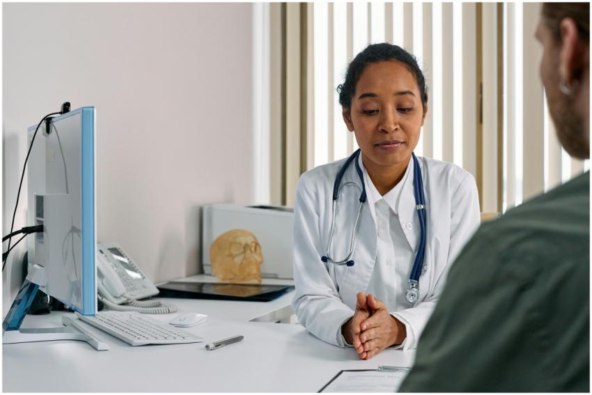 A female doctor consulting a patient in a modern m