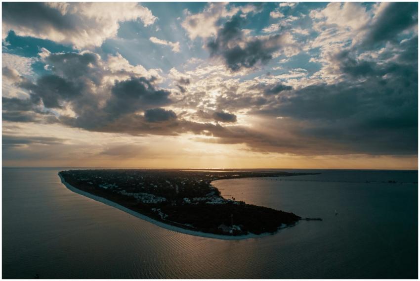 A breathtaking aerial view of a coastal island wit