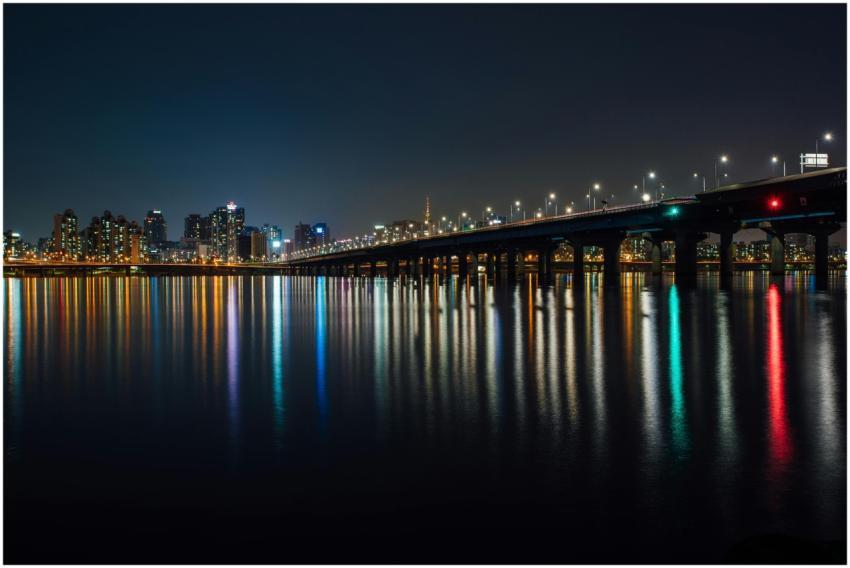 Stunning nighttime view of a city skyline and illu