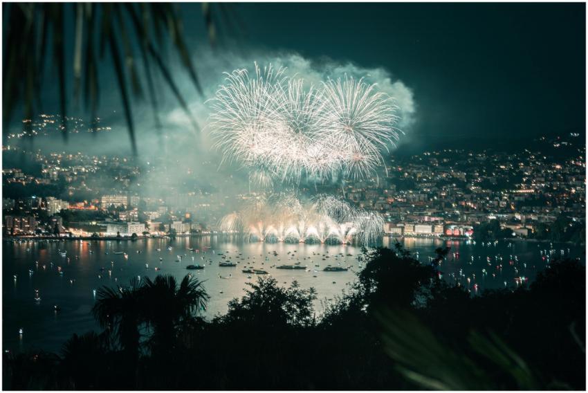 Nighttime fireworks display over Lugano, Switzerla