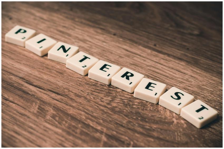 Wooden letter tiles arranged to spell Pinterest on