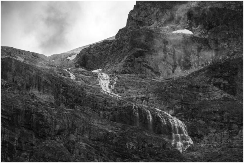 A captivating black and white view of a waterfall