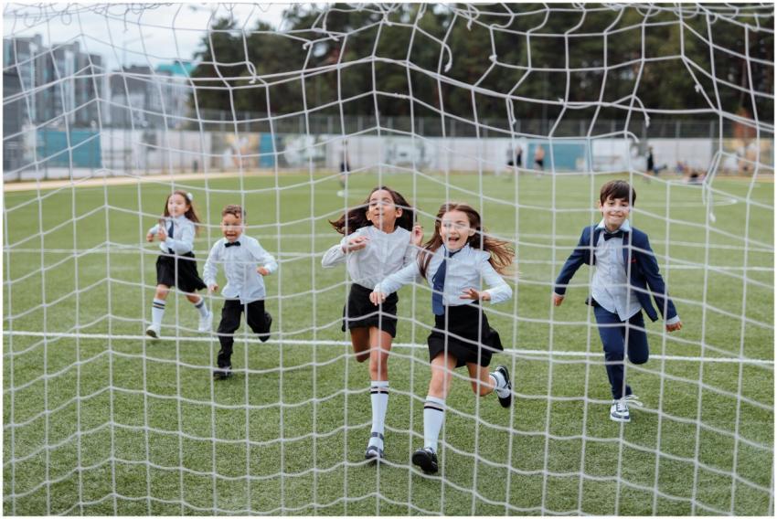 Group of children joyfully running towards the cam