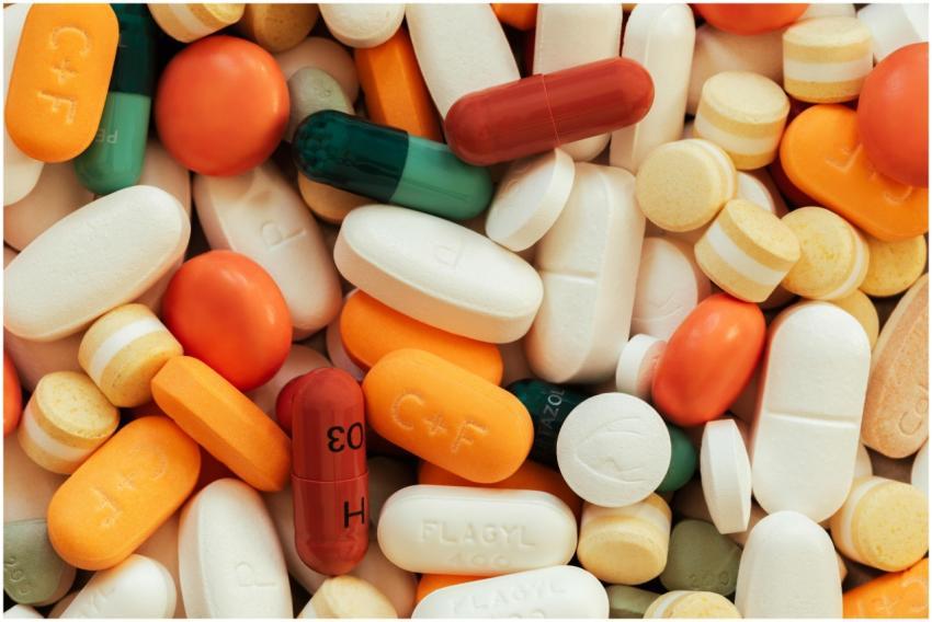 Close-up of assorted colorful pills and tablets on