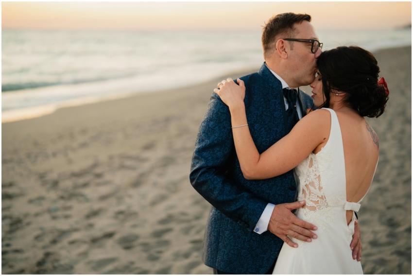 Romantic Beach Wedding Embrace