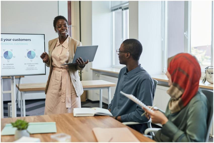 Business professionals in a meeting room focusing