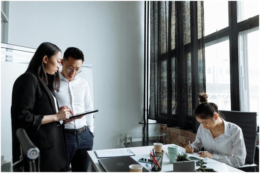 Professionals collaborating in a modern office env