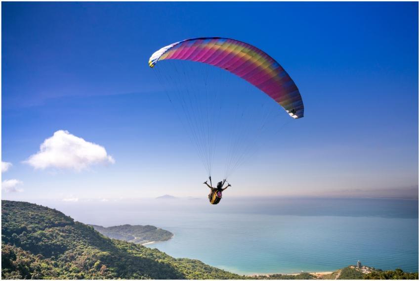 Experience the thrill of paragliding over stunning