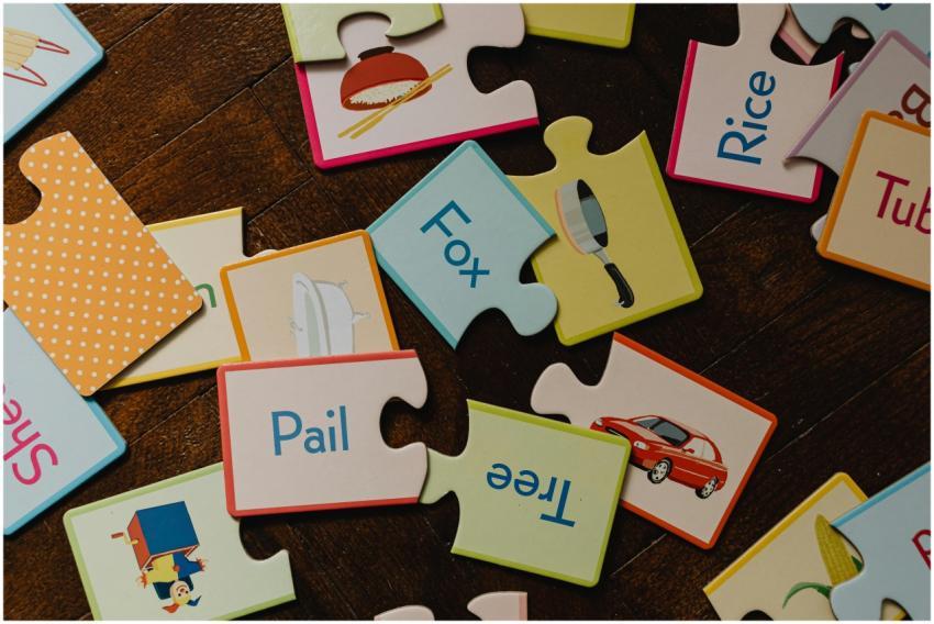 Brightly colored educational puzzle pieces featuri