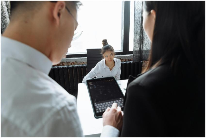 Professionals discussing project around a table us